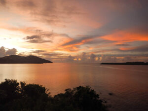 Pale pink and orange sunset over the ocean