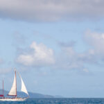 Sailboat against a blue horizon