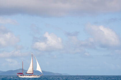 Sailboat against a blue horizon